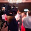 A digital camera with a gimbal attached to it is a valuable tool for photographers, providing stable and smooth footage during shooting